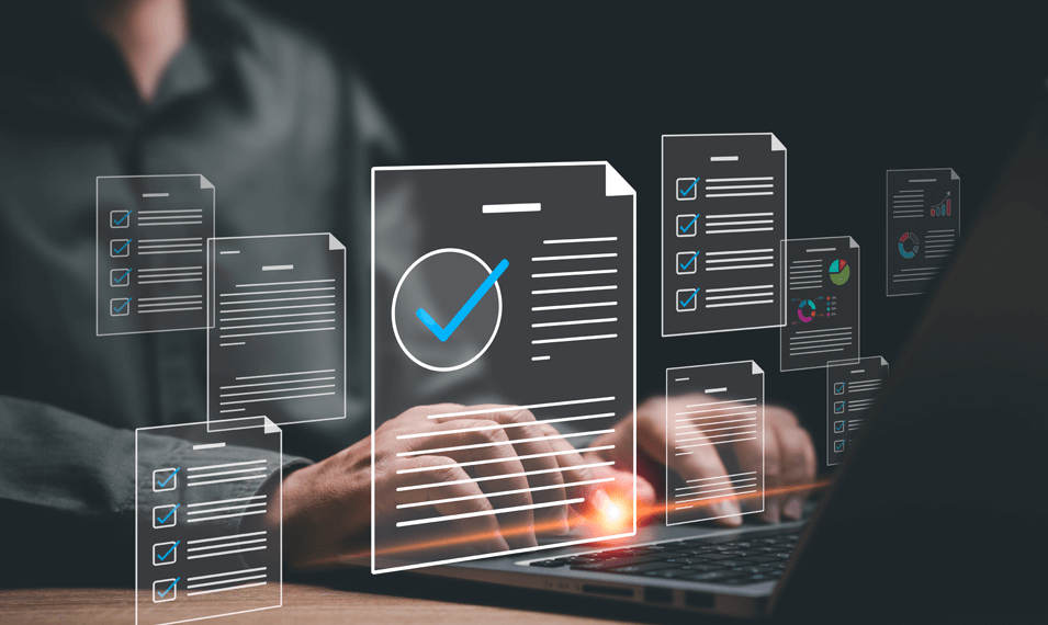 Businessman uses dealer audit management system on a laptop 